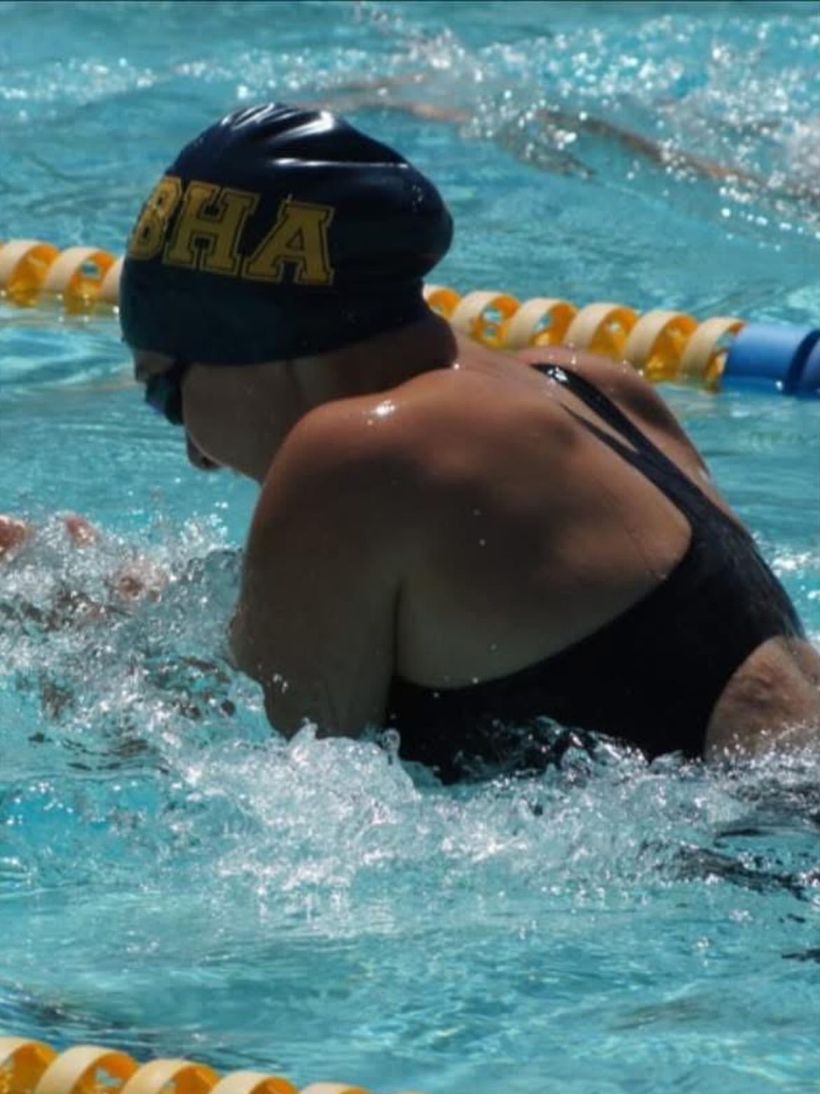 Competitive swimmer racing in a swimming pool